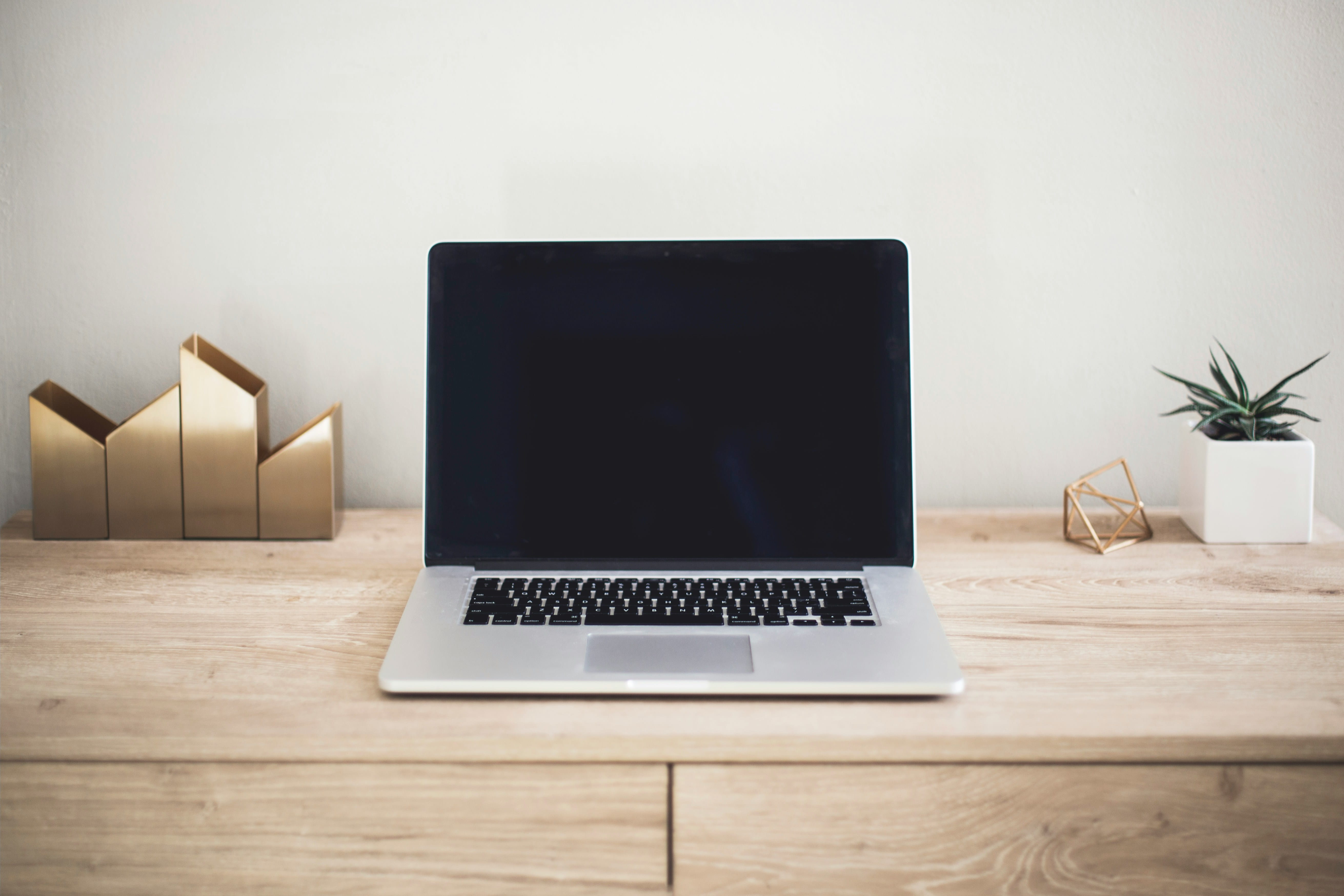 Multilingual Copywriting Agency Desk with Laptop